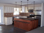 Kitchen with White Cabinetry and a Large Center Island